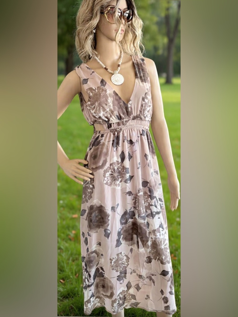 Sienna Sky floral maxi summer dress. Color is off pink/brown/ light purple.